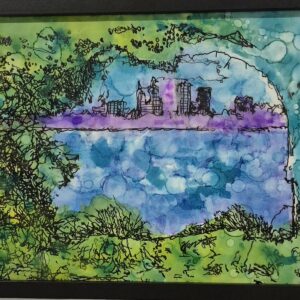 Framed by Nature – Cityscape Through the Leaves