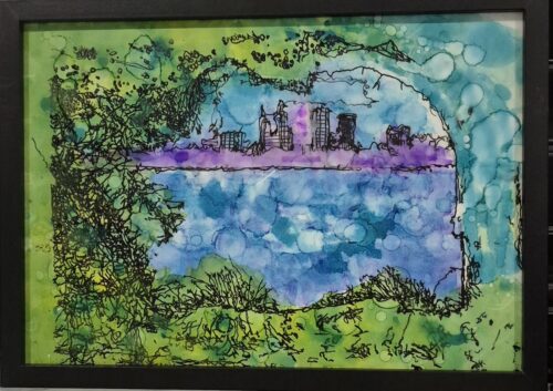 Framed by Nature – Cityscape Through the Leaves
